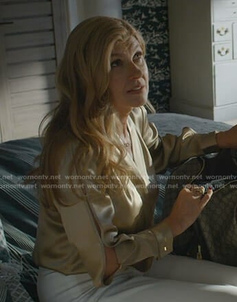 Debra's gold split sleeve top on Dirty John