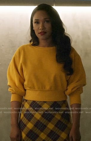Iris's yellow cropped sweatshirt and plaid skirt on The Flash