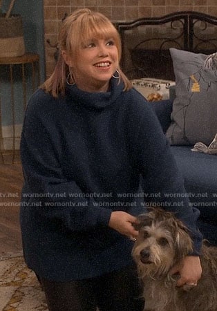 Kristin's teal blue tunic sweater on Last Man Standing