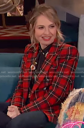 Leslie Grossman's printed tie neck blouse and tartan check blazer on Busy Tonight