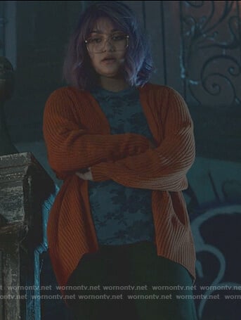 Gert's orange knit cardigan on Marvels Runaways