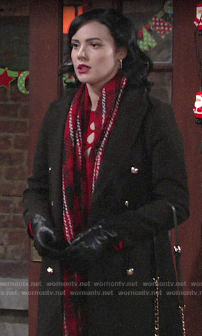 Tessa's black coat and red plaid scarf on The Young and the Restless