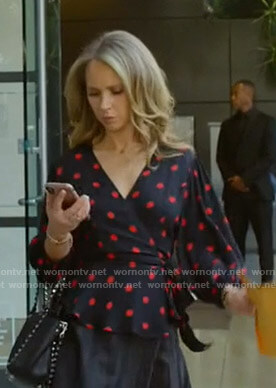 Veronica's black polka dot wrap top on Dirty John