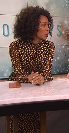 Zuri's black and yellow polka dot dress on E! News