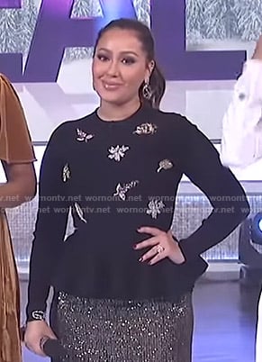 Adrienne's black embellished peplum top on The Real