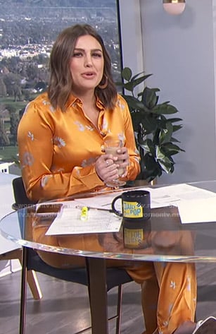 Carissa's orange floral blouse and pants on E! News Daily Pop