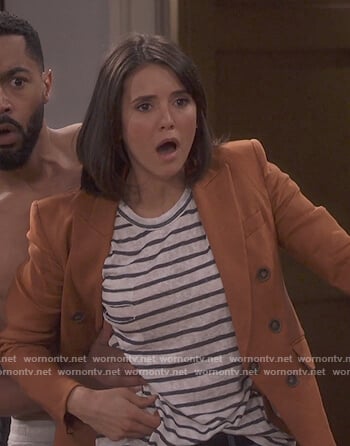 Clem's striped tee and tan jacket on Fam