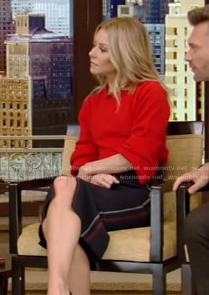 Kelly's red sweater and pencil skirt with red and white stitching on Live with Kelly and Ryan
