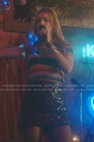 Kirby's multicolored striped top and quilted mini skirt on Dynasty