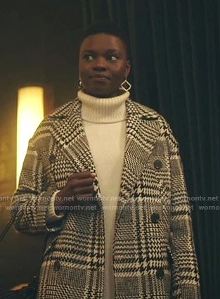 Mina's black checked coat on The Resident