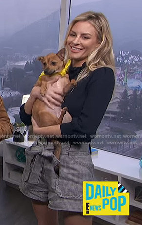 Morgan's navy mock neck sweater and belted shorts on E! News Daily Pop