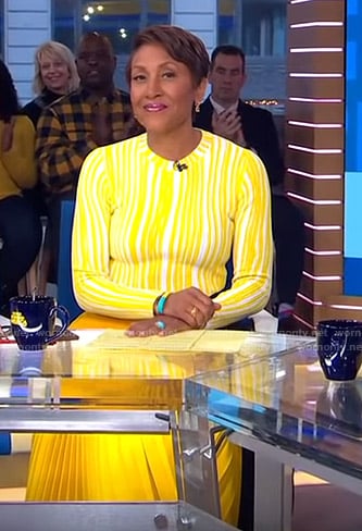 Robin's yellow striped sweater and pleated skirt on Good Morning America