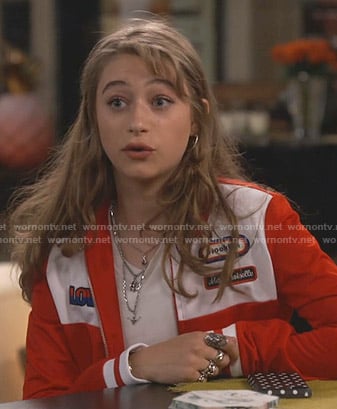 Shannon's red track jacket with patches on Fam