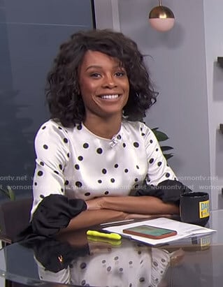 Zuri's white polka dot ruffled sleeve top on E! News Daily Pop