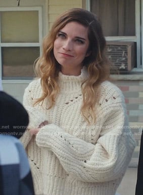 Alexis's white chunky knit sweater on Schitt's Creek