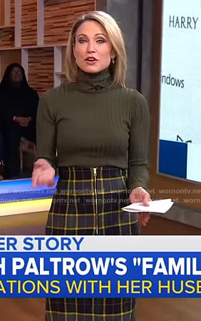 Amy's green ribbed turtleneck sweater and checked skirt on Good Morning America