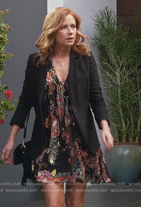Lena's black floral print mini dress on Splitting Up Together