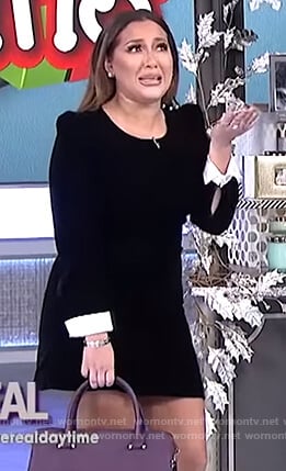 Adrienne's black velvet dress with pearl buttons on The Real