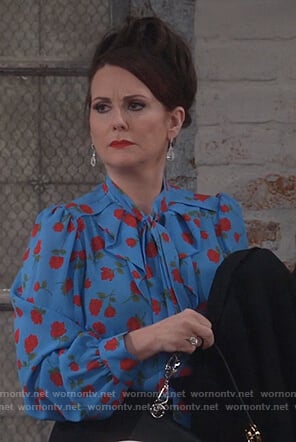 Karen's blue rose print tie neck blouse on Will and Grace