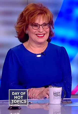 Joy's blue embellished sleeves blouse on The View