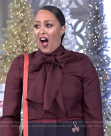 Tamera's maroon tie neck sweater on The Real