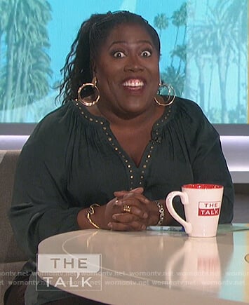 Sheryl's green studded top on The Talk