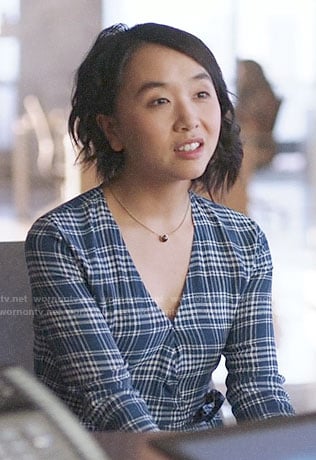 Mackenzie's blue plaid wrap top on Supergirl