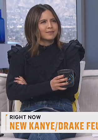 Erin's navy ruffle trim sweater on Live from E!