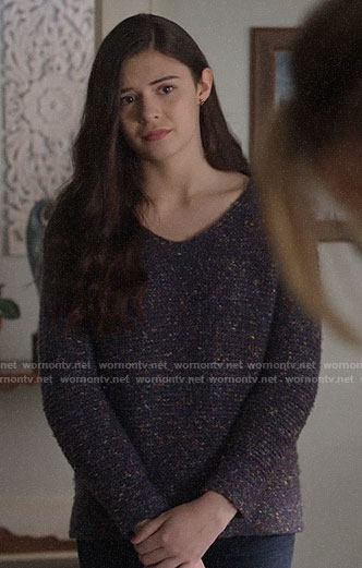 Nia's blue speckled sweater on Supergirl