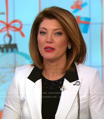 Norah's white blazer with silver buttons on CBS This Morning