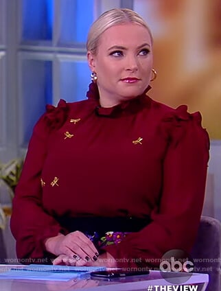 Meghan's maroon dragonfly embellished blouse and floral skirt on The View