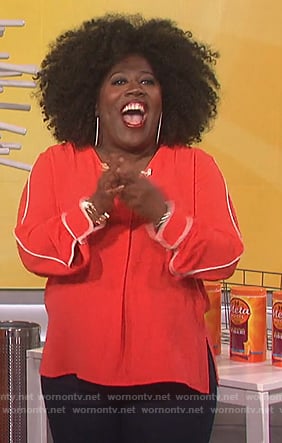 Sheryl's red piped trim top on The Talk