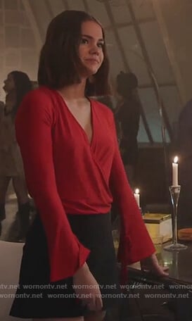 Callie's red wrap top with tie cuffs on Good Trouble