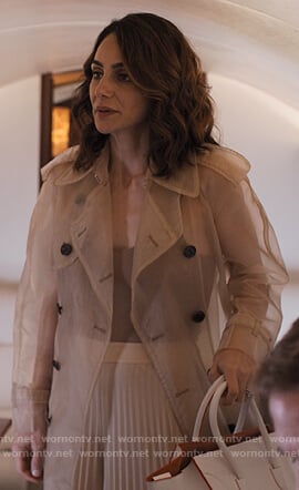 Sam's sheer trench coat and pleated pants on Friends from College