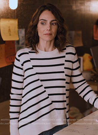 Sam's white asymmetric stripe sweater on Friends from College