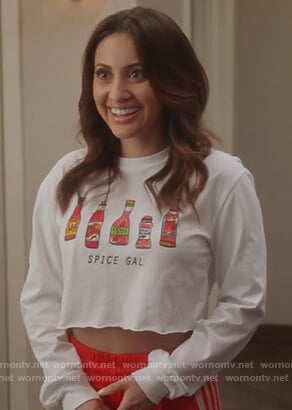 Ana's Spice Gal tee with orange striped pants on Grown-ish