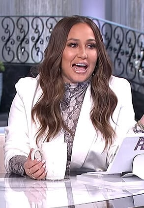 Adrienne's snake print high neck top on The Real