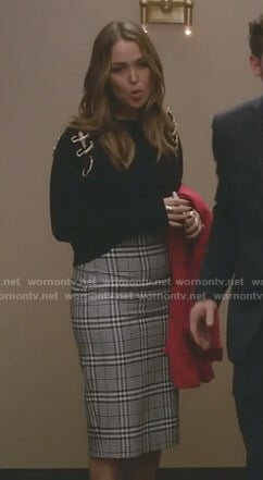 Jo's black safety-pin detail sweater and checked pencil skirt on Grey's Anatomy