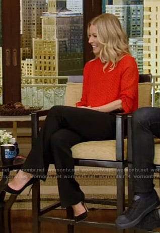 Kelly's red polka dot top and black pants on Live with Kelly and Ryan