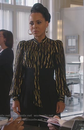 Tegan's black metallic tie neck blouse on How to Get Away with Murder