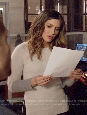 Dinah's white sweater with grey cuffs on Arrow