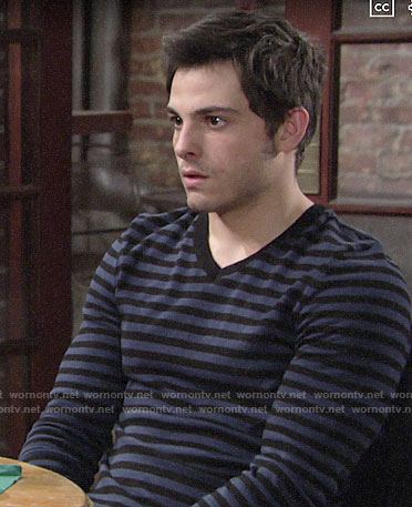 Fen's blue striped v-neck sweater on The Young and the Restless