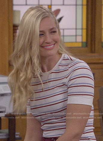 Gemma's white striped top on The Neighborhood
