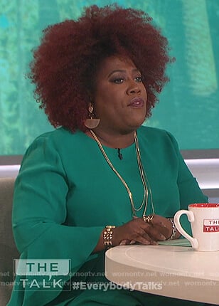 Sheryl's bell sleeve asymmetric top on The Talk