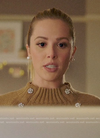 Lucy's tan sweater with jewel buttons on Charmed
