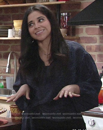 Mia's blue leopard print wrap blouse on The Young and the Restless