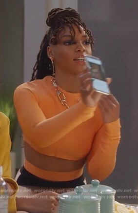 Jazlyn's orange crop top with waist cutout on Grown-ish