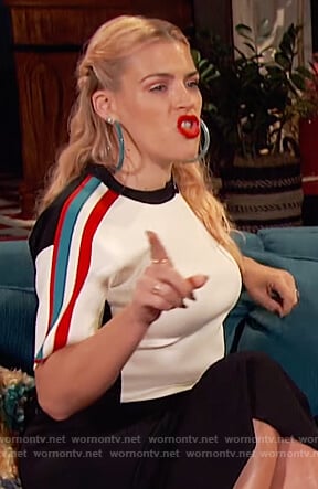 Busy's white short-sleeve striped sweater on Busy Tonight