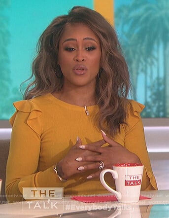 Eve's yellow ruffle shoulder sweater on The Talk