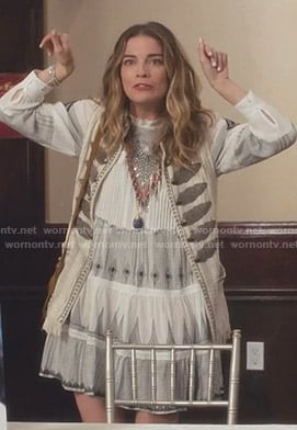 Alexis white embellished vest and embroidered dress on Schitt's Creek